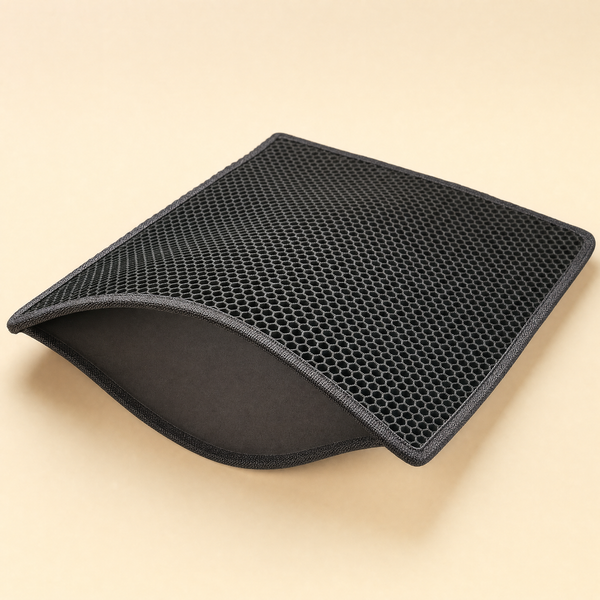 Tapis de litiere double epaisseur, vue studio montrant les deux couches