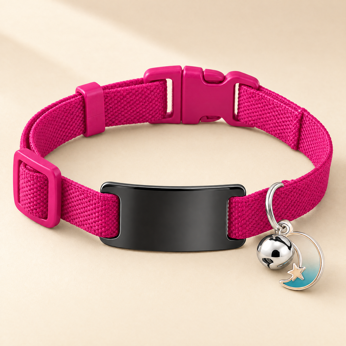 Collier chat élastique fuchsia, médaille noire