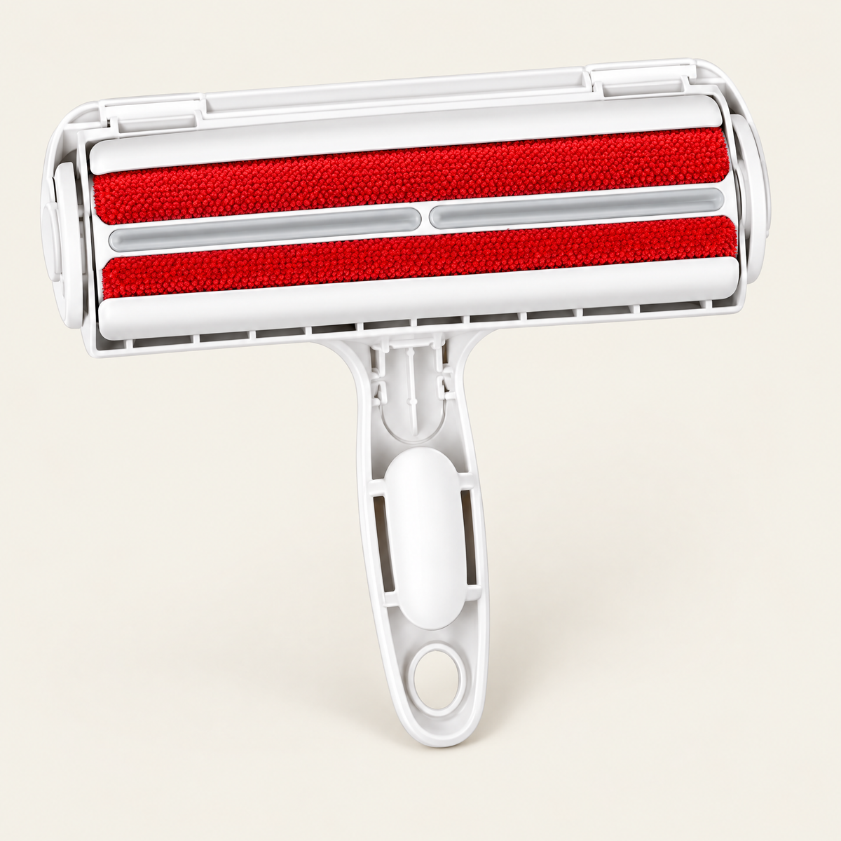 Rouleau anti-poils réutilisable rouge, sur fond crème
